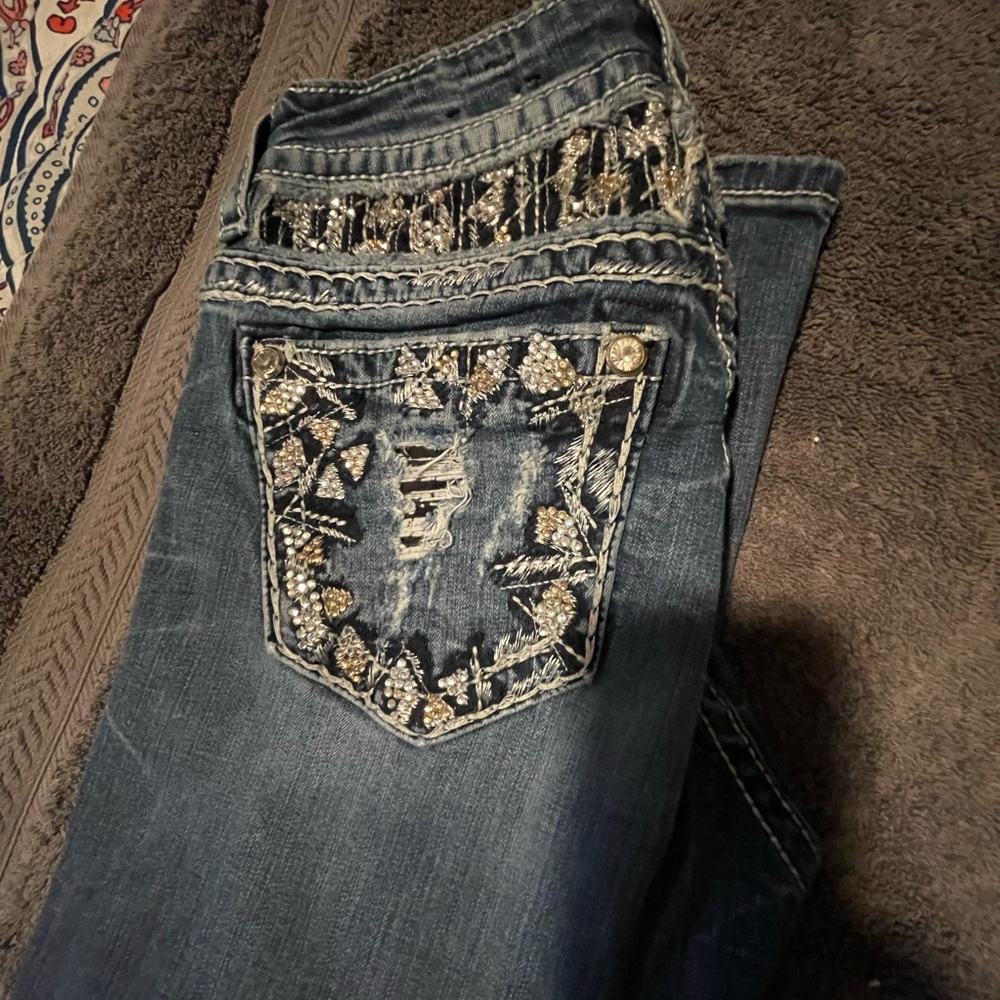 Woman’s size 25 miss me jeans easy boot cut style.